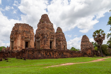 East Baray temple in rainy season. This is one of the bigger temples with nice elephant statues in Siem Reap, Cambodia. Rainy season makes for nice colors as the green plants and blue skies with cloud