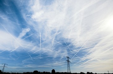 Chemtrails over the blue sky