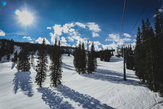 Chair Lift In Aspen. View From A Chair Lift Or Gondola In American Ski Slope