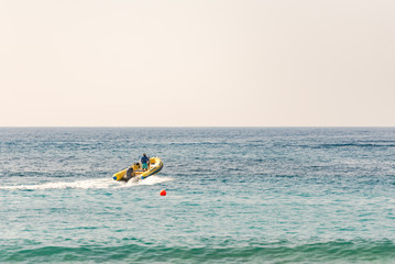 Pathos. Cyprus. The November 2019. Motor boat and jet ski. People have fun on vacation.