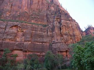 Close up of the red walls of steep cliffs at the Temple of Sinawava, Zion National Park, Utah.
