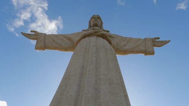 Huge Cristo Rei statue on the top of Almada in Lisbon - travel photography