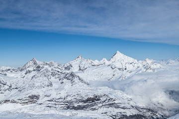 Fototapeta na wymiar Panorama - alps in clouds 