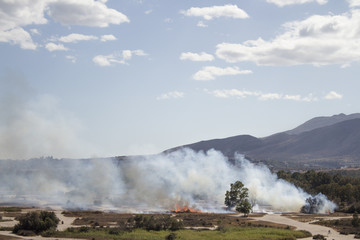 Fototapeta premium Mountain landscape with fire