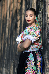 Beautiful woman wearing traditional slovak folk costumes. .