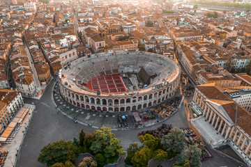 Aerial drone shot view of sunrise on ancient roman amphitheatre Verona Arena (Arena di Verona) in Verona, Italy - obrazy, fototapety, plakaty