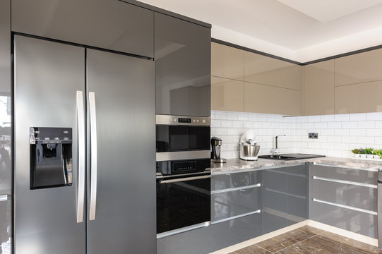 Luxury modern white, beige and grey kitchen interior