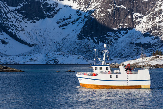 Fishing boat on Lofoten islands in winter