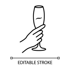 Hand holding wine glass linear icon. Champagne stemware. Glassful of alcohol drink. Wine service. Celebration. Thin line illustration. Contour symbol. Vector isolated outline drawing. Editable stroke