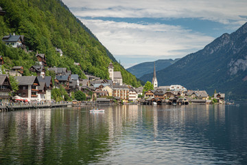 Fototapeta na wymiar View on lake in austrian town hallstatt during tourist season in summer