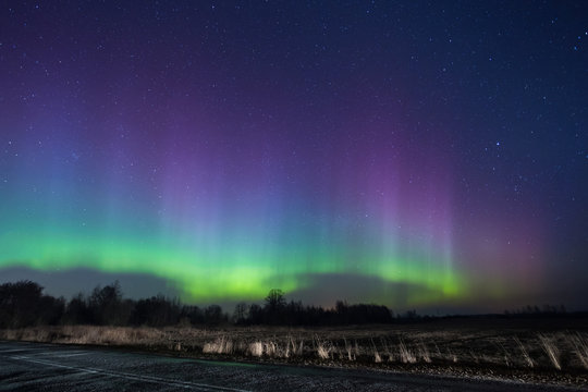 bright aurora in russia, outside the city