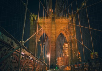 Brooklyn Bridge at night lights buildings background