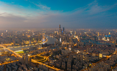 Panoramic aerial view of the night view at dusk in Shanghai, China