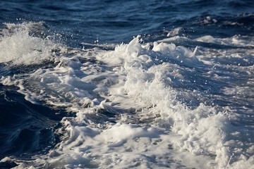 Waves splashing in the sea water