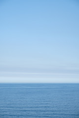 Cloudy horizon and Fog over the sea waves, natural background