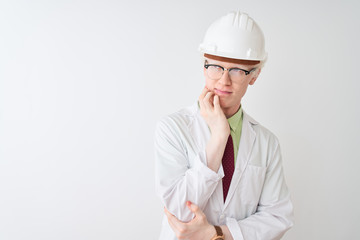 Albino scientist man wearing glasses and helmet standing over isolated white background thinking looking tired and bored with depression problems with crossed arms.