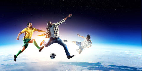 Obraz na płótnie Canvas Soccer man in action with ball. Mixed media