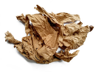 Crumpled paper ball isolated on white background. Crumpled paper texture. Brown crumpled paper texture for background.