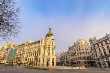 Madrid Spain, city skyline at famous Gran Via shopping street
