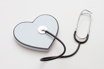 Big heart with medical diagnostic stethoscope , health care concept