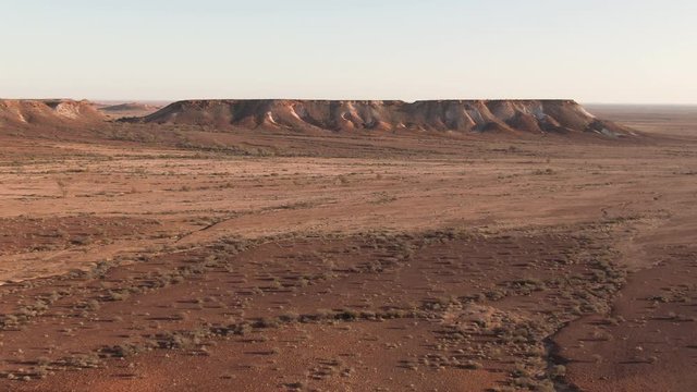 Aerial: Footage of Coober Pedy Breakaways. Tourism South Australia. Outback roadtrip.