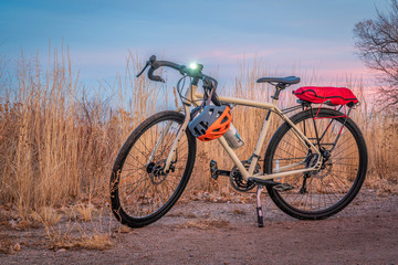 Naklejka na ściany i meble touring bicycle on a bike trail in late fall