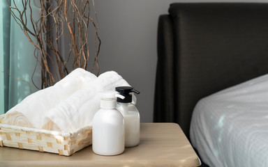 Fototapeta na wymiar Liquid soap and shampoo bottle in bedroom. Hygiene and healthy life concept. 