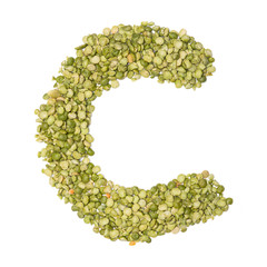 Letter C of the English alphabet from freshly  green chopped peas  on a white isolated background. Food pattern made from peas. bright alphabet for shops. pea cereal