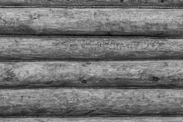rough gray wooden timber background , black and white log wall texture , beam walls close up for building design
