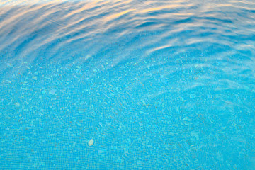 Fototapeta na wymiar Swimming pool and sunlight refraction