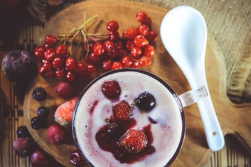 milk yogurt with berries and jam.