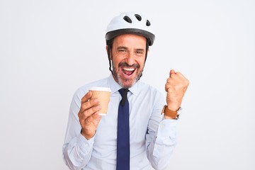 Middle age businessman wearing bike helmet drinking coffee over isolated white background screaming proud and celebrating victory and success very excited, cheering emotion