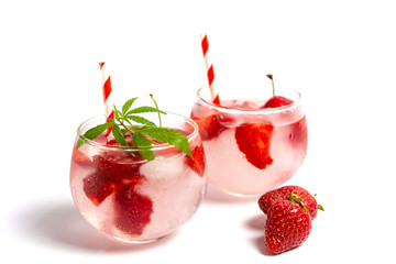 Strawberry juice with marijuana with fruit slices flat lay