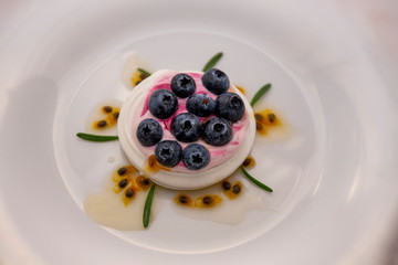 Dessert Pavlova of meringue with fresh fruit