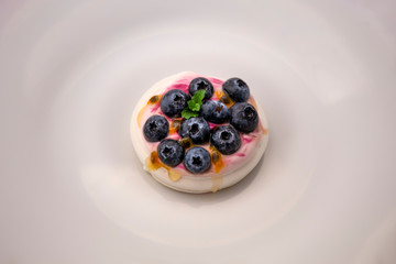 Dessert Pavlova of meringue with fresh fruit