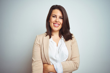 Young beautiful elegant business woman over isolated background with a happy and cool smile on...