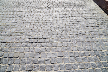 Paving slabs of bricks on the ground. Brick background outdoor