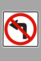 Sign--No Left Turn isolated on grey.