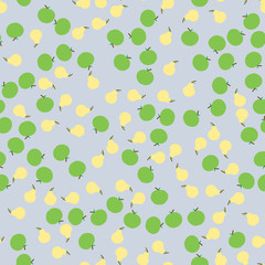 Fragrant yellow pears and green apples with a small leaf