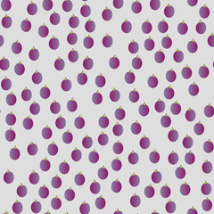 Fragrant ripe plums with a leaf arranged in a staggered order