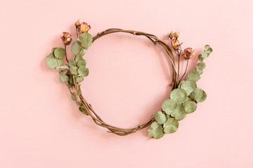 Wreath made of dried eucalyptus branches and roses