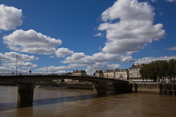 Fototapeta premium Beautiful clouds above the river Loire in Nantes in France, Europe