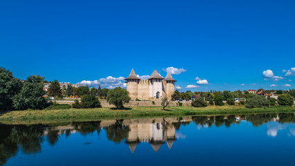 Fototapeta na wymiar soroca fortress reflected in nistru river shot on drone, historic fort in the Republic of Moldova