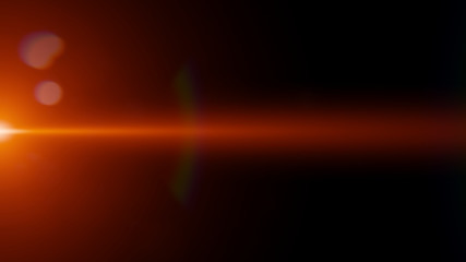 abstract orange lens flare effect overlay texture with bokeh effect and light streak in front of a black background