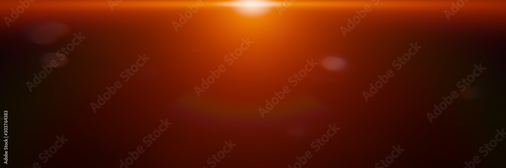 Wall mural centred abstract orange lens flare effect overlay texture with bokeh effect and light streak in fron