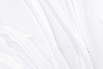 White gray satin texture that is white silver fabric silk background with beautiful soft blur pattern natural.