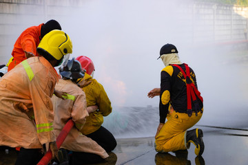 Firefighters practicing firefighting. To prevent a fire accident. A fire will cause a huge loss of property and money. Regular training will create expertise. If there is a fire in the future.