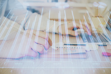 Multi exposure of financial graph with man works in office on background. Concept of analysis.