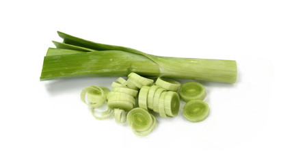 Fresh leek on a white background. Fresh green garlic isolated. 