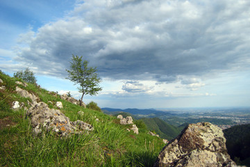 Fototapeta na wymiar Moddoy panorama from Monte di Nese towards Po valley, Bergamo, Italy.